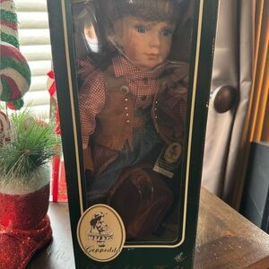 Geppeddo Collectible Doll with Brown and Red Outfit